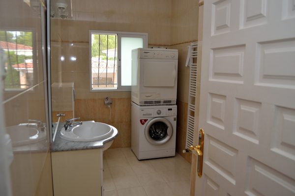 chalet-arcos-vigas-palmeras-piscina-05